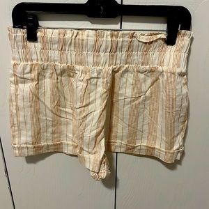 Brand new Forever21 cream/maple shorts that are a size large but they run small